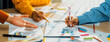 © Summit Art Creations - Startup company employee working together, analyzing BI dashboard paper on financial data report and planning strategic marketing for business success in panorama banner. Synergic