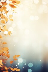 Wall Mural - Dry Yellow Leaves and Tree Branches on Blue and Orange Gradient Blur Bokeh Background. Copy Space for Autumn Banner or Poster
