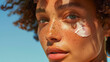 Portrait of pretty woman with freckles on face applying sunscreen cream on sensitive skin on cheek. Generative AI