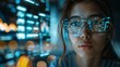 © Purichaya - Intense focus of a female cyber expert amidst a collage of AR data panels, showcasing IT security insights