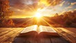 Sunset Enlightenment: An Open Book Bathed in Golden Sunlight Amidst Nature
