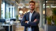 © Ameer - Confident young entrepreneur exuding leadership in modern corporate office setting