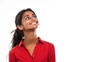 © pariketan - Indian business woman in red shirt smiling looking at the future