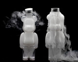 Fototapeta  - Plastic teddy bear bottle filled with swirling mist and fog creating strange effects shapes and textures