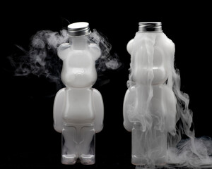 Wall Mural - Plastic teddy bear bottle filled with swirling mist and fog creating strange effects shapes and textures