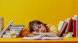 A tired schoolgirl sleeps among books on yellow background. Sleeping person surrounded by books.
