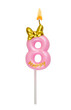 Pink birthday candle with gold bow isolated on white background. Number 8.