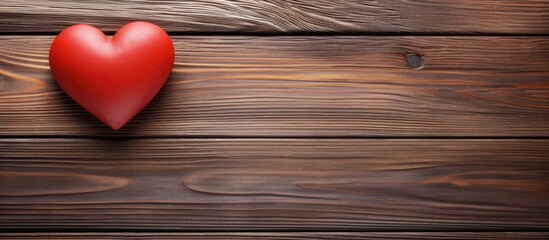 Aufkleber - A copy space image of a red heart is placed on a rustic wood background perfect for Valentine s Day