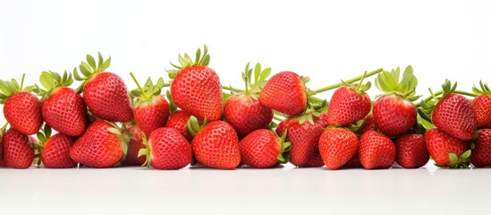 Wall Mural - A copyspace image featuring fresh natural strawberries on a white background leaving space for text. Creative banner. Copyspace image