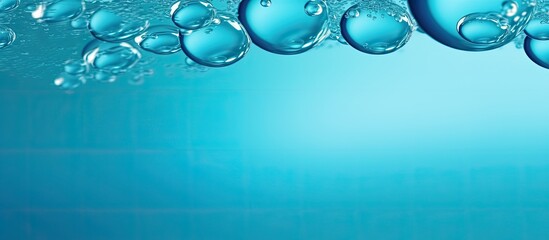 Poster - A vibrant macro abstract image showcases round bubbles of carbon dioxide floating in the translucent blue waters of the ocean providing ample copy space