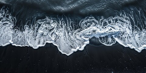 Wall Mural - Aerial Photography of Waves crashing on a black sand beach in Iceland**