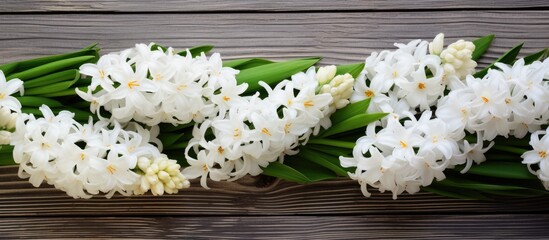 Poster - White hyacinths in a bouquet placed on a weathered wood background create a visually captivating copy space image