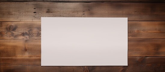 Poster - An image of note paper on an aged wooden table with ample copy space