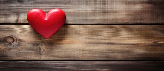 Aufkleber - A copy space image of a red heart is placed on a rustic wood background perfect for Valentine s Day