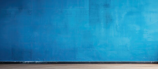 Aufkleber - A vibrant blue wall serves as the backdrop allowing for ample space to add images or text