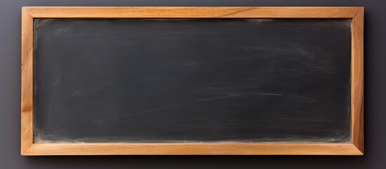 Poster - A blackboard with a wooden frame is shown against a white background with a piece of note paper providing space for writing or drawing. Creative banner. Copyspace image