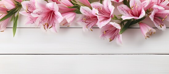 Poster - A copy space image showcasing beautiful alstroemeria flowers on a white wooden background surrounded by a willow branch