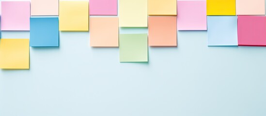 Poster - A minimal style flat lay with colorful sticky notes on a pastel background The image provides ample copy space and is captured from a top view