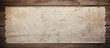 © HN Works - A worn out sheet of paper rests on a rustic wooden surface creating a nostalgic and vintage atmosphere in the copy space image