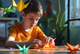 American Preschooler Boy Folding Paper Craft in Room, Preparation for Origami Exhibition. Fictional Character Created By Generative AI. 