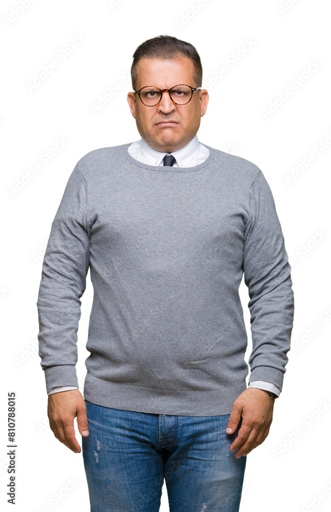 Middle age bussines arab man wearing glasses over isolated background skeptic and nervous, frowning upset because of problem. Negative person.