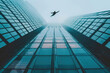 Man practicing base jumping from a city building. One of the most dangerous extreme sport.