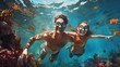 Happy family snorkeling in tropical sea swimming