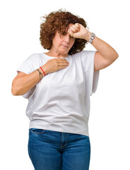 Sticker - Beautiful middle ager senior woman wearing white t-shirt over isolated background Touching forehead for illness and fever, flu and cold, virus sick