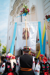 Wall Mural - People in traditional Polish folk costumes at Łowicz Corpus Christi procession