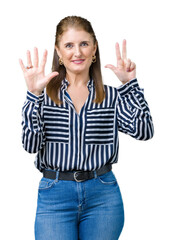 Sticker - Middle age mature business woman over isolated background showing and pointing up with fingers number eight while smiling confident and happy.