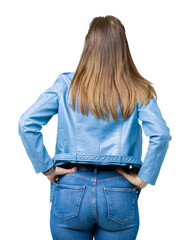 Poster - Beautiful middle age mature woman wearing fashion leather jacket over isolated background standing backwards looking away with arms on body