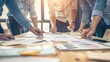 © lililia - business people analyze a cost graph on a desk in a meeting room, against a light background, fostering collaboration and synergy.