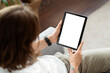 Woman At Home Using Digital Tablet With Blank Screen, Comfortable Seating, Leisure Time, Copy Space, Modern Technology