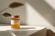 Jar of honey on table