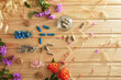 Natural medicines with plants and flowers on wooden table