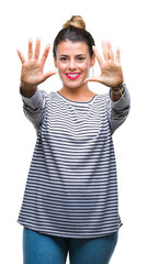 Poster - Young beautiful woman casual stripes sweater over isolated background showing and pointing up with fingers number ten while smiling confident and happy.