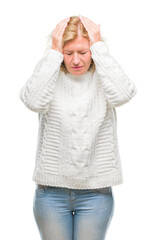 Sticker - Middle age blonde woman wearing winter sweater over isolated background suffering from headache desperate and stressed because pain and migraine. Hands on head.