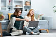 Happy Couple Relaxing With Laptop At Home, Enjoying Time Together, Casual Lifestyle, Modern Living Room