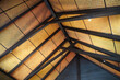 Roof interior design with black metal construction and handmade bamboo weaving mat for modern,tropical and Bali style decorations. Selective focus