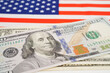 America flag with US dollar banknote, finance banking concept.