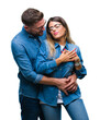 © Krakenimages.com - Young couple in love wearing glasses over isolated background smiling with hands on chest with closed eyes and grateful gesture on face. Health concept.