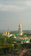 Wall Mural - Aerial view of the Kiev Pechersk Lavra and Great Lavra Bell Tower, Ukraine. Vertical video. 