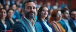 © Антон Сальников - A diverse group of entrepreneurs listens to a keynote address by a startup company with an innovative product or service at an international technology conference.