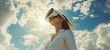 Young woman experiencing virtual reality under a bright sky