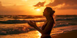Serene woman meditating on beach at sunset