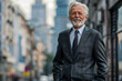 © Volodymyr - The mature older businessman, adorned in a sleek suit, gazes into the distance with a content smile, his mind filled with visions of future success, while standing amidst the urban backdrop, his