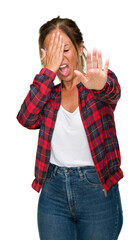 Wall Mural - Middle age adult woman wearing casual jacket over isolated background covering eyes with hands and doing stop gesture with sad and fear expression. Embarrassed and negative concept.
