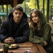 © shelbys - A young couple enjoying lunch together outdoors Fictional Character Created By Generative AI.
