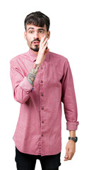 Wall Mural - Young handsome man wearing pink shirt over isolated background hand on mouth telling secret rumor, whispering malicious talk conversation
