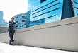 © peopleimages.com - Outdoor, wall and businessman in city thinking of development in property or real estate mockup. Realtor, entrepreneur and man with arms crossed at office building with idea, opportunity or progress